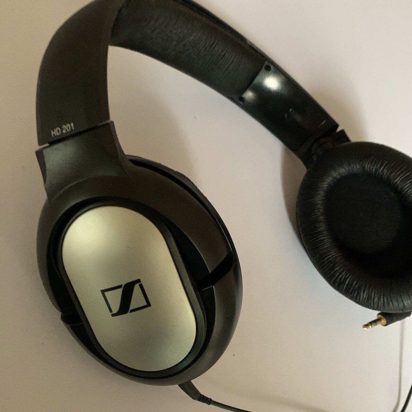 Sennheiser HD201 Headphones *Sound Working But broken from headband